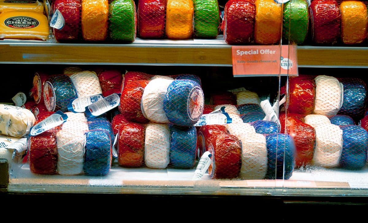 Wheels in coloured wax coatings on a shelf